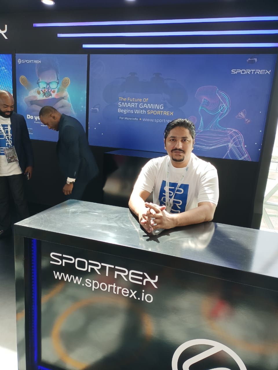 Afzal at a Web3 conference booth